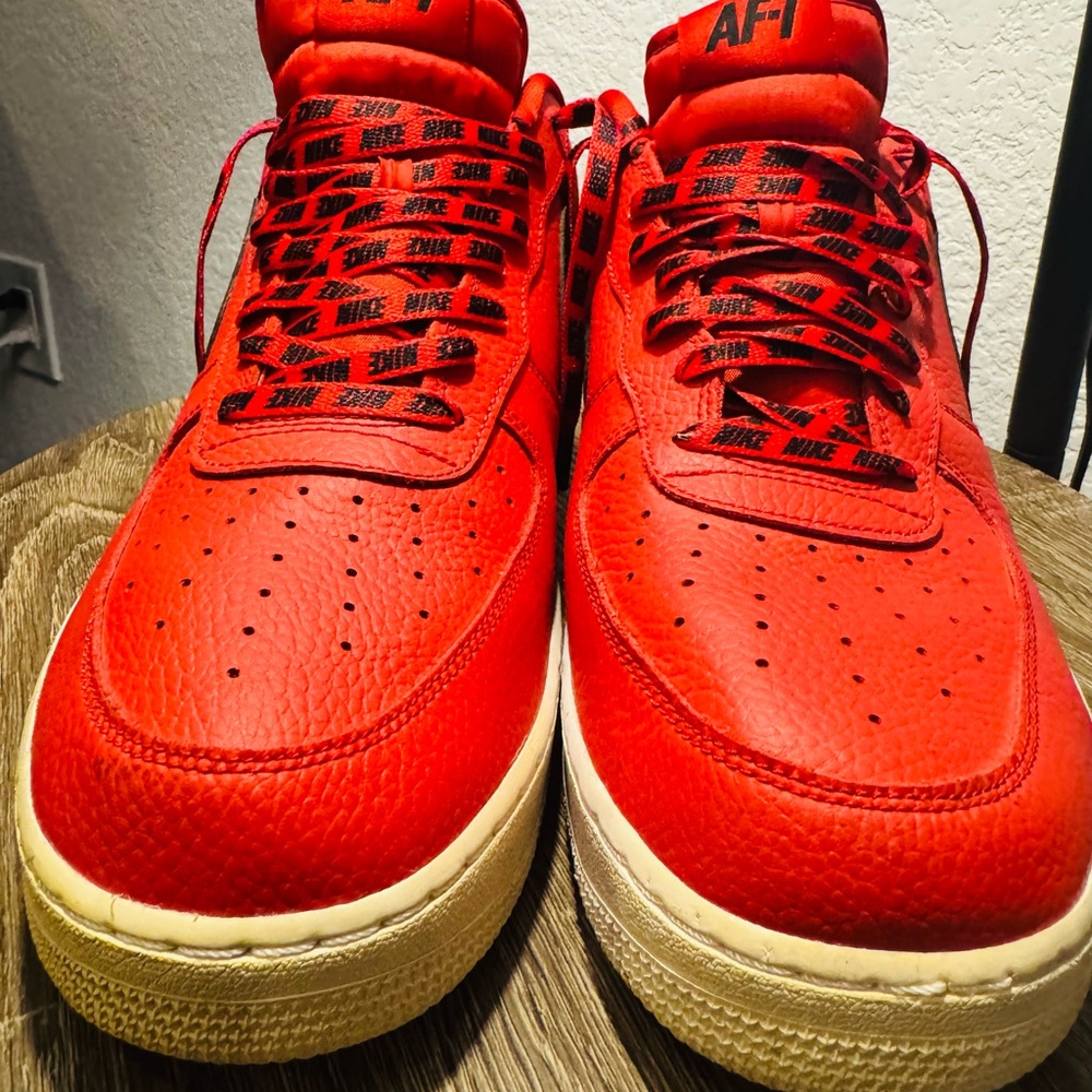 Nike Air Force 1 Low NBA "University Red/Black" from the "Statement Game" pack.